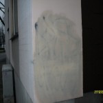 Graffitientfernung gestrichene Wand
