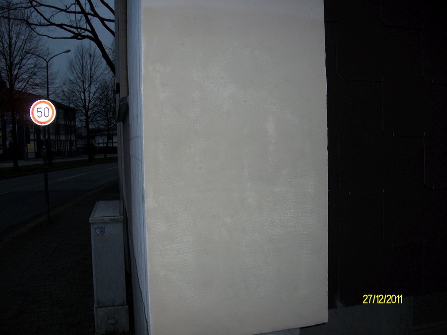 Graffitientfernung gestrichene Wand