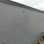 Garage mit Bundsteinputz